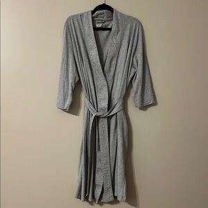 Jockey Light weight Robe. Attached tie on back. Pockets.